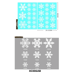 Detailed specs of 12 white snowflake window decals in various sizes for Christmas decor