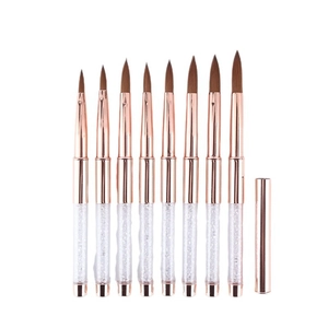 Set of 8 rose gold nail art brushes with glitter handles and brown bristles