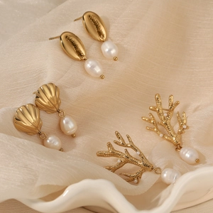 Golden ocean series earrings set with seashell coral charms and elegant white pearls