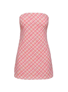 Close-up of pink and orange plaid fabric on a strapless slim-fit mini dress