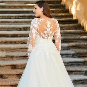 Elegant white lace long sleeve wedding dress with illusion back and pearl buttons