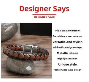 Close-up of brown and black leather woven bracelet with a magnetic silver alloy clasp