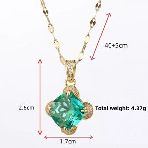 Detail view of emerald-cut green gemstone pendant with dimensions 2.6x1.7cm and weight 4.37g