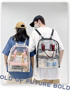 Detailed view of clear PVC backpack with pink and black trim showing large capacity and items