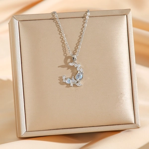 Elegant silver tulip moon pendant necklace with moonstone and sparkling zircons