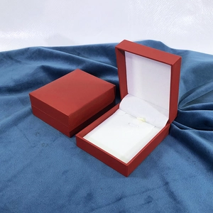 Matte red rectangular jewelry box for necklaces with white inner lining and sleek grid pattern