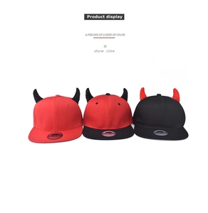 Three hip-hop snapback hats with devil horns in red and black colors on white background