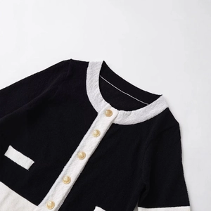 Slim fit black and white tweed short sleeve jacket with elegant gold buttons