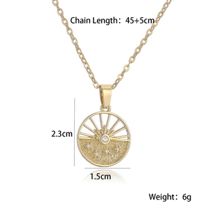 Detailed view of gold geometric sunburst pendant with small stars and dimension specs