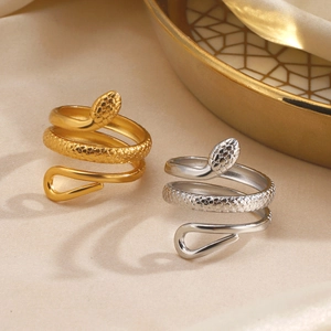 Minimalist stainless steel snake wrap rings in gold and silver with scale textures