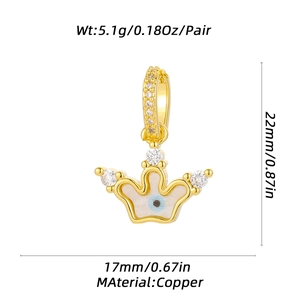 Detail of crown-shaped pendant with enamel evil eye and sparkling zircon inlay