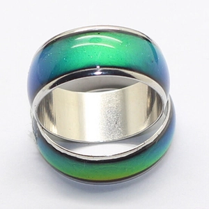 6mm color changing mood ring for couples in polished stainless steel on white background