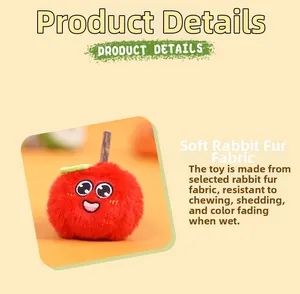 Detail of red plush cat toy made of soft rabbit fur with fruit shape and embroidery