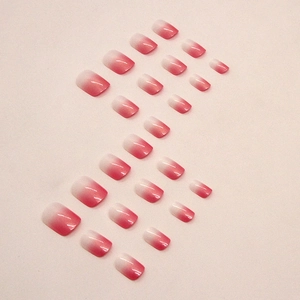 Faux ongles dégradés rose et blanc, forme carrée-arrondie, finition brillante