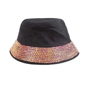 Close-up of pink and purple rhinestones on a black cotton disco bucket hat