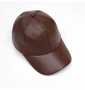 Detail view of brown PU leather baseball cap with textured finish and Jamont logo