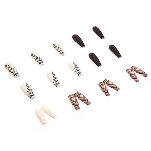 Long coffin fake nails featuring leopard print, matte brown, and heart patterns
