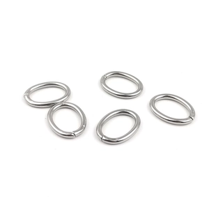Five silver stainless steel oval jump rings for DIY jewelry making and bag hardware