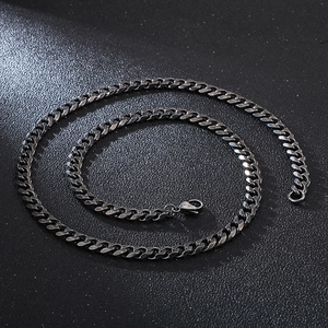 Close-up of vintage black titanium steel Cuban chain necklace with dense links for men