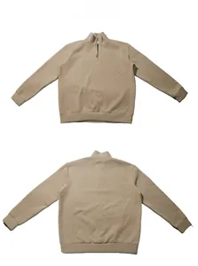 Detail view showing front and back of khaki quarter-zip pullover with waffle texture