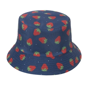 Detailed view of red strawberry embroidery on navy blue cotton canvas bucket hat