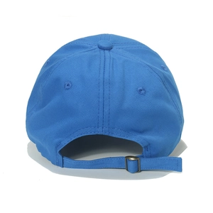 Rear view of blue cotton baseball cap with adjustable bronze metal buckle and vents