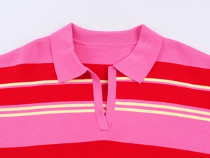 Close-up of pink and red striped knit polo shirt with high-quality ribbed texture