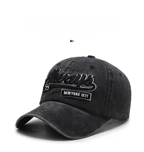 Close-up of vintage washed black cotton baseball cap with New York City embroidery