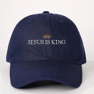 Navy blue baseball cap with Jesus Is King embroidery and crown icon for sun protection