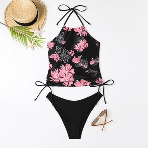 Close-up of tropical floral print bikini top with side drawstrings and high cut bottom