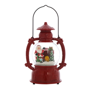 Red vintage Christmas lantern snow globe with Santa Claus, tree and gifts inside