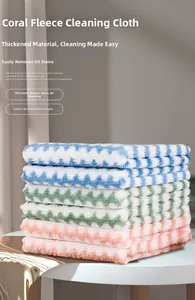 Detail of coral velvet dish cloths with soft fiber texture and wave patterns