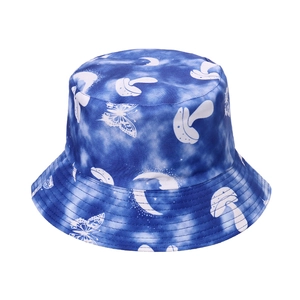 Tie-dye blue bucket hat with mushroom and butterfly prints for summer sun protection