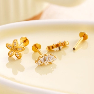 F136 Titanium gold flower and fan threadless labret studs with sparkling crystals
