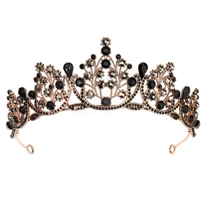 Detail of rose gold bridal crown featuring vintage black crystals and floral vine design