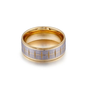 Silver brushed titanium steel ring with gold tire tread pattern and polished inner band