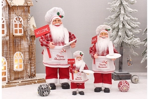 Three-piece set of chef Santa Claus figures in red plaid outfits with welcome signs