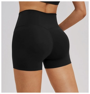 Close-up of black high-waisted yoga shorts featuring V-shape back seam for lifting effect