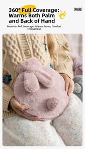 Plush pink bunny hot water bottle with 360-degree hand wrap design for winter warmth
