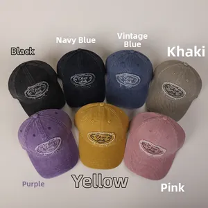 Detail view of cotton baseball caps showing embroidered patches in seven vintage colors