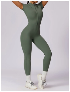 Olive green short-sleeve yoga jumpsuit featuring a front zipper and bodycon fit