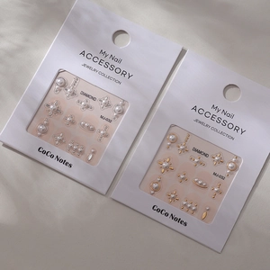 Detail of MJ-032 gold and silver star pearl nail art stickers with adhesive backing