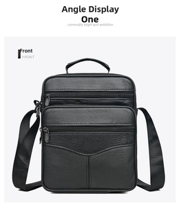 Front view of black pebbled leather crossbody bag with multiple zip compartments