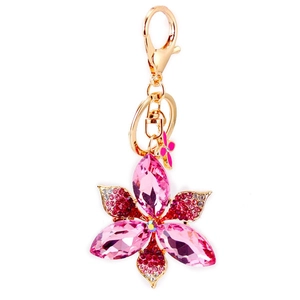 Pink crystal orchid flower keychain with sparkling rhinestones on golden ring and clasp