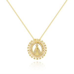 Macro shot of 18K gold plated Virgin Mary pendant with sparkling zircon halo detail