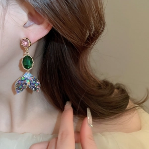 Fashionable mermaid tail drop earrings with pink and green gemstones in a three-tier design