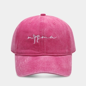 Detail of mama embroidery and bow design on pink washed cotton baseball cap