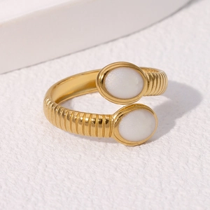 Vintage gold plated stainless steel ring with ribbed texture and white shell inlay