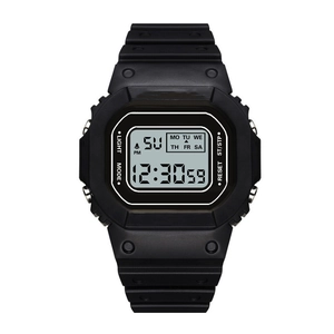 Macro shot of waterproof LED sports watch dial with digital display and side buttons