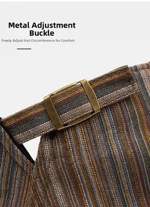 Detail of adjustable metal buckle on striped beret hat for custom fit size